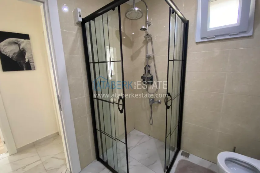 Kupuj  3+1 dwupiętrowy prywatny dom z basenem i w pełni umeblowany w Kargicak 27 
