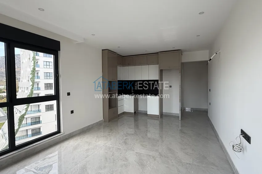 Kupuj  Nowoczesny apartament z dwiema sypialniami i widokiem na góry w kompleksie mieszkalnym na poziomie hotelu, Mahmutlar - Alanya 2 