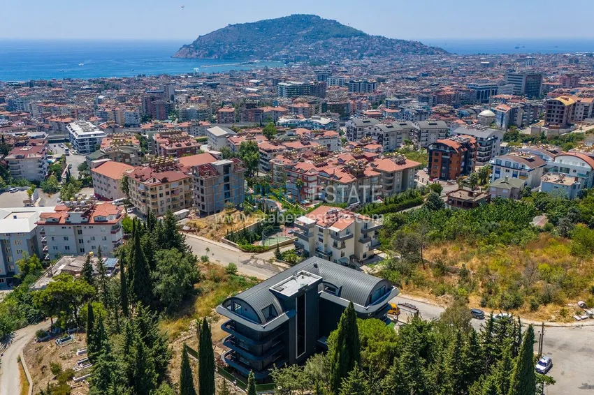 Nowoczesne apartamenty 1+1 w Alanyi, dzielnica Buyuk Hasbahce — podstawowa nieruchomość  1 