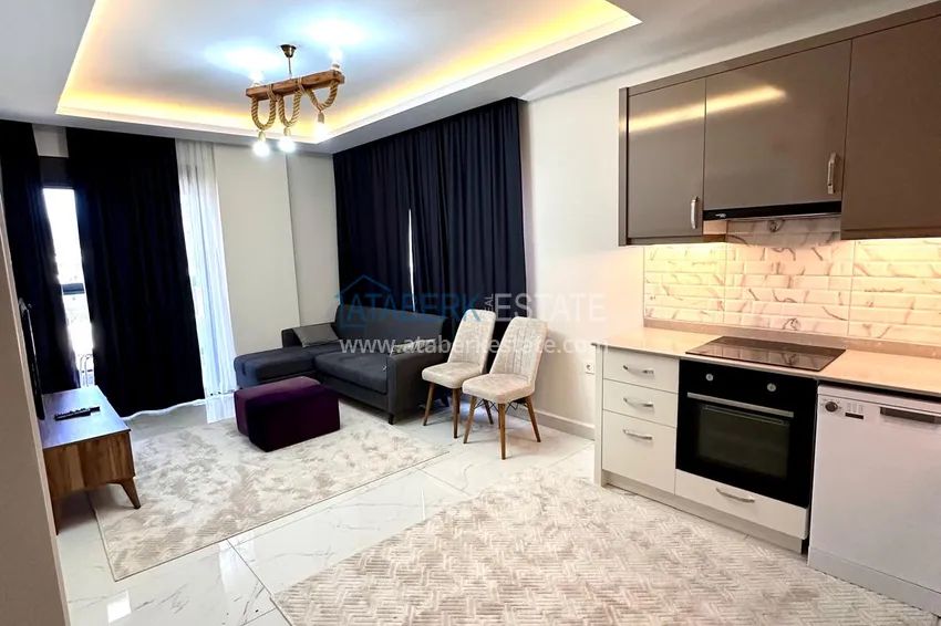 Kupuj  Apartament 1+1 z nowymi meblami i przeszklonym balkonem w nowym budynku — Alanya, dzielnica Górna Oba 2 