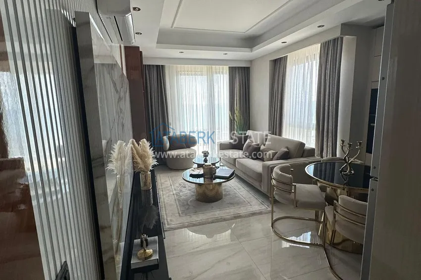 Kupuj  Apartament z dwiema sypialniami i widokiem na morze, pierwszy apartament na wybrzeżu - Alanya, dzielnica Mahmutlar 4 