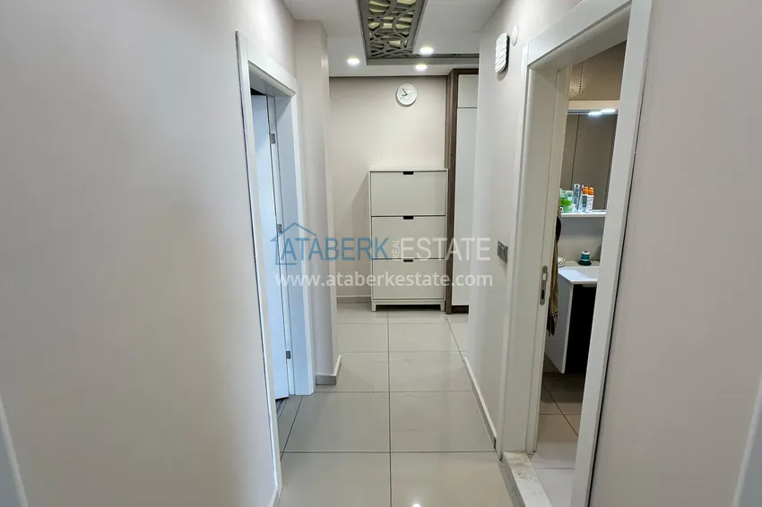 Kupuj  Dwupokojowy apartament z meblami i przeszklonymi balkonami w Konyaalti, Liman - 600 m do plaży 4 