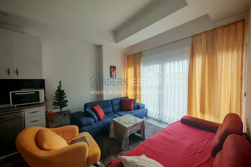 Kupuj  1+1 mieszkanie z meblami i działką w kompleksie mieszkalnym - Alanya, dzielnica Avsallar 4 