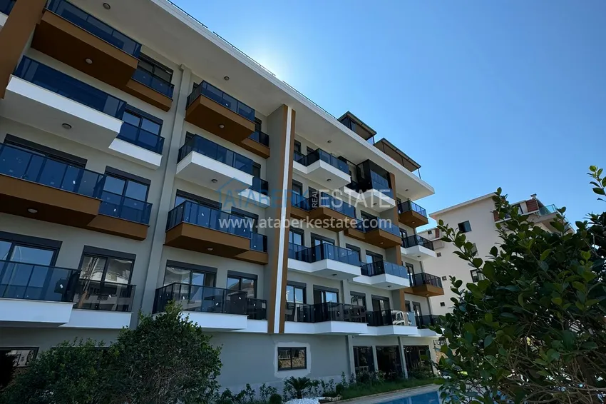 Apartament 1+1 z nowymi meblami i przeszklonym balkonem w nowym budynku — Alanya, dzielnica Górna Oba 5 