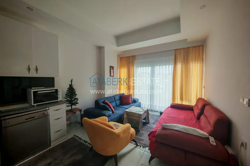 Kupuj  1+1 mieszkanie z meblami i działką w kompleksie mieszkalnym - Alanya, dzielnica Avsallar 5 