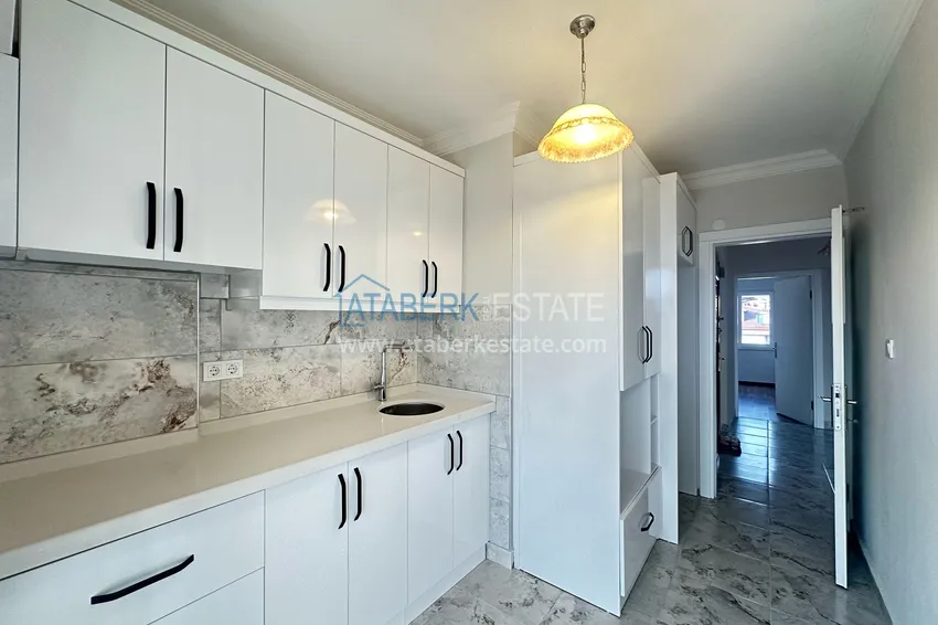 Kupuj  Apartament 2+1 po remoncie kosmetycznym w kompleksie miejskim przy głównej ulicy Oba 5 