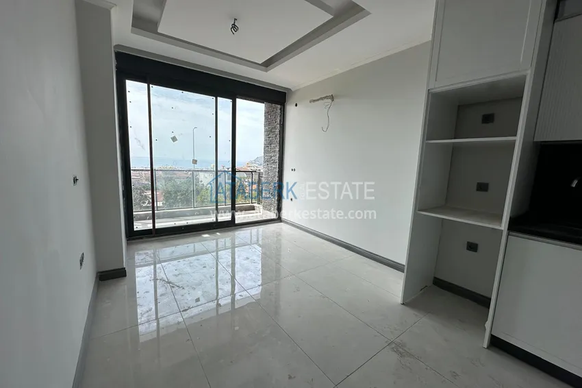Kupuj  Penthouse 1+1 z pięknym wykończeniem w elitarnym kompleksie — centrum Alanyi, dzielnica Buyuk Hasbahce  5 