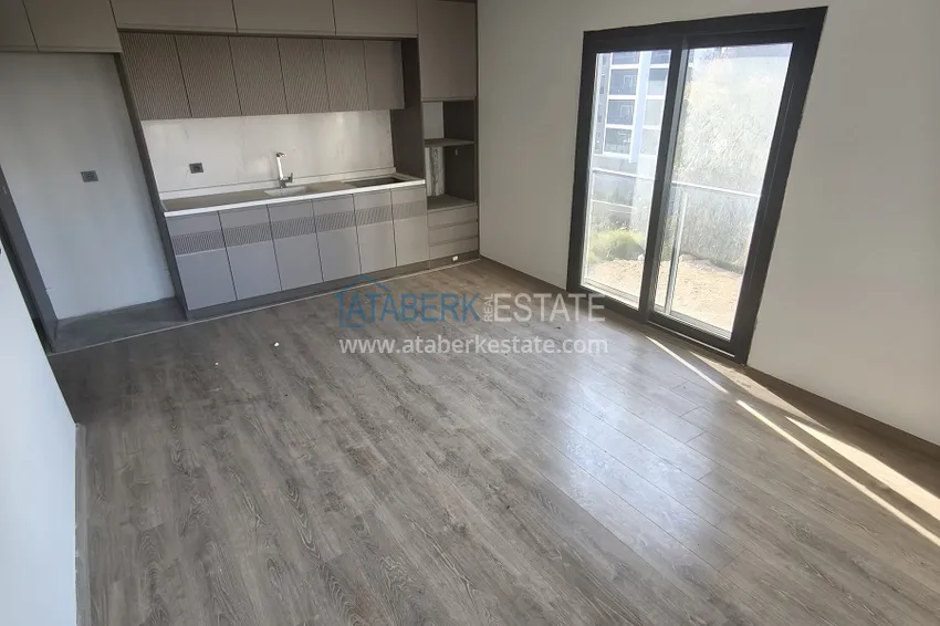 Kupuj  Apartament 1+1 z wysokiej jakości wykończeniem — Mersin, dzielnica Arpachbakhshish 5 