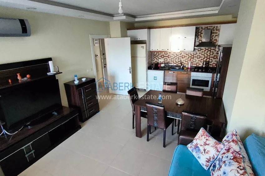Kupuj  Apartament 1+1 o powierzchni 76 m2 umeblowany w komfortowym kompleksie — Alanya, dzielnica Mahmutlar 6 