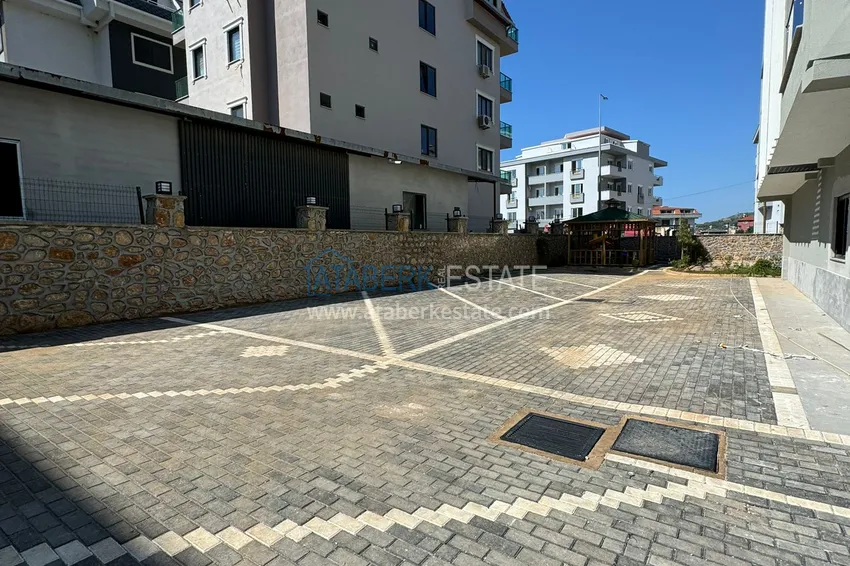 Apartament 1+1 z nowymi meblami i przeszklonym balkonem w nowym budynku — Alanya, dzielnica Górna Oba 7 