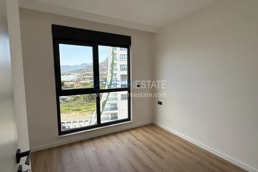 Kupuj  Nowoczesny apartament z dwiema sypialniami i widokiem na góry w kompleksie mieszkalnym na poziomie hotelu, Mahmutlar - Alanya 7 