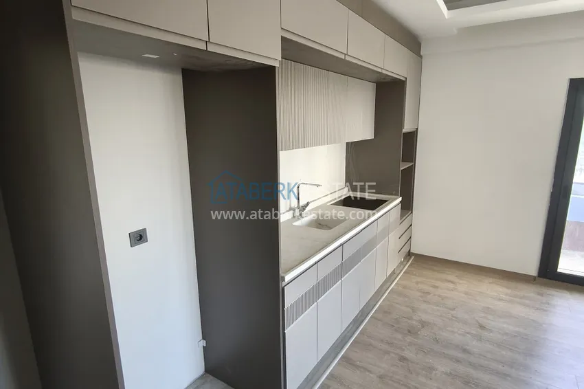Kupuj  Apartament 1+1 z wysokiej jakości wykończeniem — Mersin, dzielnica Arpachbakhshish 7 