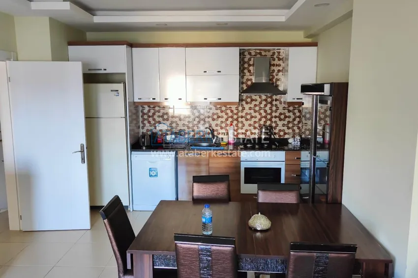 Kupuj  Apartament 1+1 o powierzchni 76 m2 umeblowany w komfortowym kompleksie — Alanya, dzielnica Mahmutlar 7 