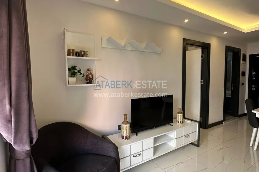 Kupuj  Przytulny apartament z jedną sypialnią z meblami w kompleksie butikowym — centrum Alanyi 9 