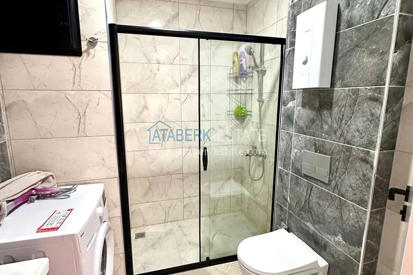 Kupuj  Apartament 1+1 z nowymi meblami i przeszklonym balkonem w nowym budynku — Alanya, dzielnica Górna Oba 9 