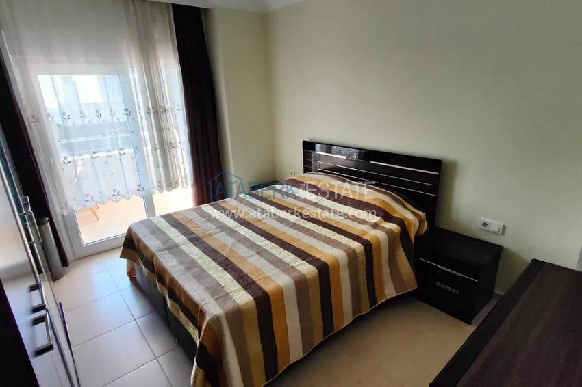 Kupuj  Apartament 1+1 o powierzchni 76 m2 umeblowany w komfortowym kompleksie — Alanya, dzielnica Mahmutlar 9 