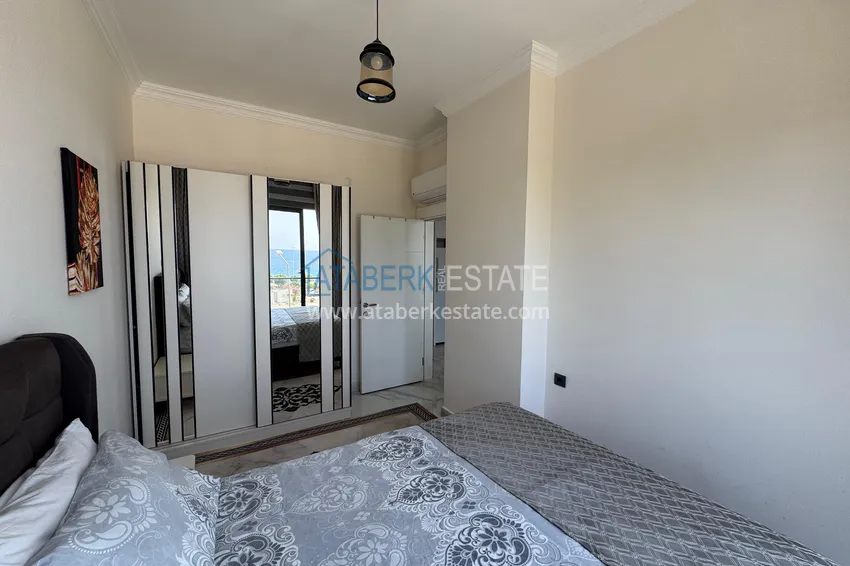 Kupuj  Jednopokojowy apartament z meblami i widokiem na morze w okazyjnej cenie — Kargicak, Alanya 12 