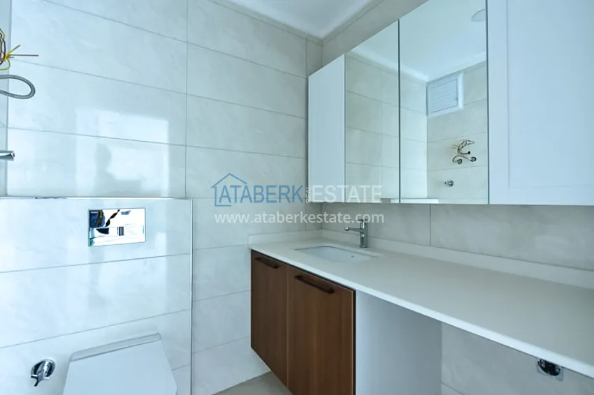 Kupuj  Apartament 1+1 z widokiem na morze w prestiżowym kompleksie — dzielnica Kargicak, 200 metrów od morza  12 