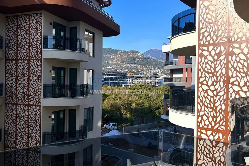 Kupuj  Apartament 1+1 z pięknym wykończeniem w dzielnicy Alanya - Oba  12 