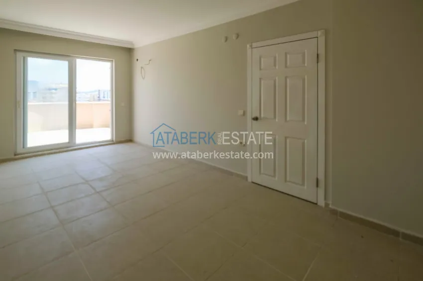 Kupuj  Dwupoziomowy penthouse 4+1 z widokiem na góry i morze — Alanya, dzielnica Mahmutlar  12 