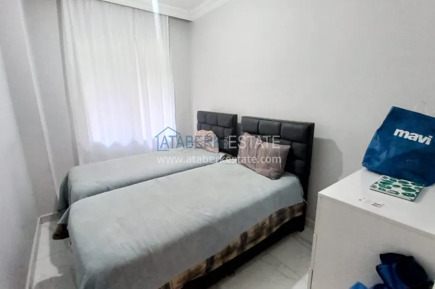 Kupuj  Trzypokojowy apartament miejski z meblami i oddzielną kuchnią w centrum Alanyi  13 