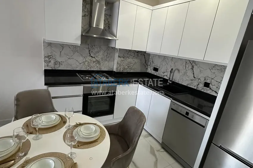 Kupuj  Stylowy apartament z nowymi meblami w nowoczesnym kompleksie — Alanya, dzielnica Kargicak 2 