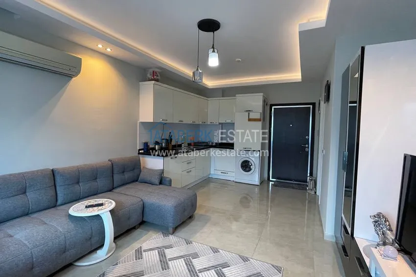 Kupuj  Umeblowane studio typu penthouse z widokiem na góry w Mahmutlar, Alanya  1 