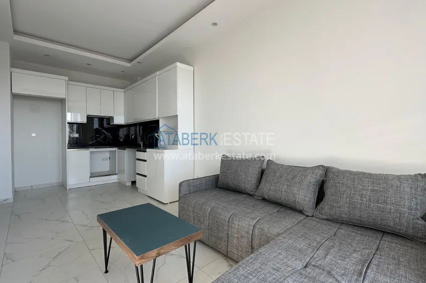 Kupuj  Apartament z widokiem na morze i nowymi meblami w rodzinnym kompleksie — Kargicak, Alanya 1 