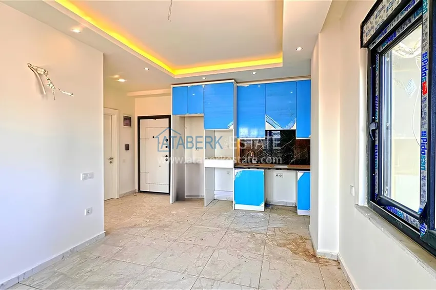 Kupuj  Apartament 1+1 z pięknym wykończeniem i widokiem na góry — Alanya, dzielnica Avsallar 2 