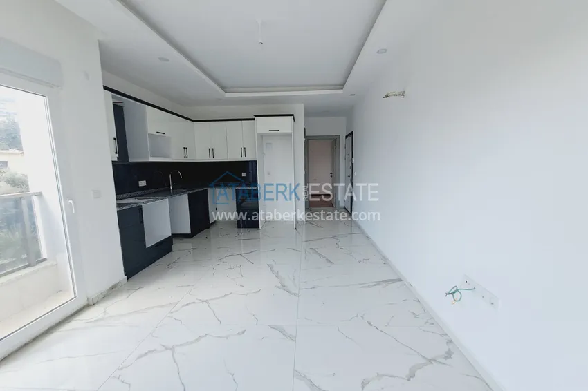 Kupuj  1+1 narożny apartament z pięknym wykończeniem w nowoczesnym kompleksie - dzielnica Avsallar, Alanya 2 