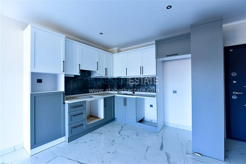 Kupuj  Apartament 1+1 z widokiem na morze w prestiżowym kompleksie — dzielnica Kargicak, 200 metrów od morza  3 