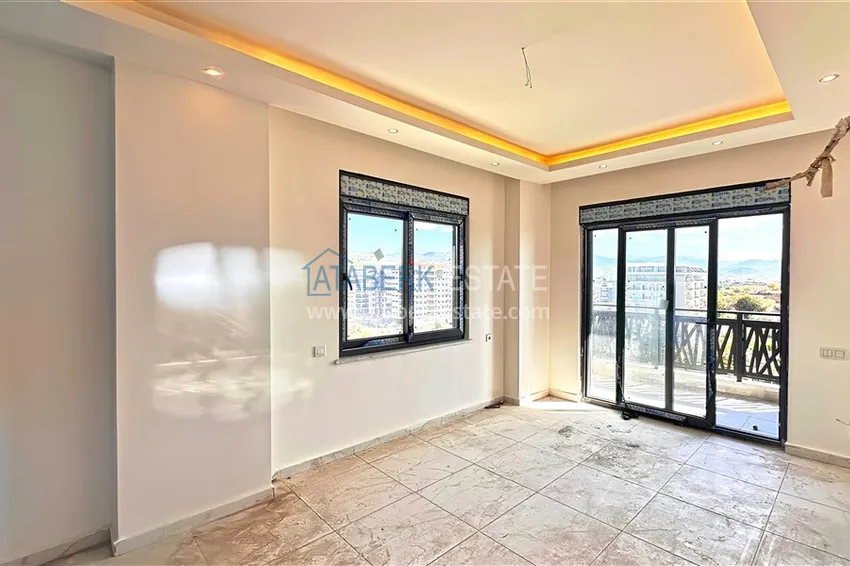 Kupuj  Apartament 1+1 z pięknym wykończeniem i widokiem na góry — Alanya, dzielnica Avsallar 3 