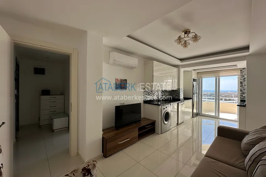 Kupuj Apartament 1+1 z meblami i widokiem na morze w centrum Alanyi - Plaża Kleopatra 3 