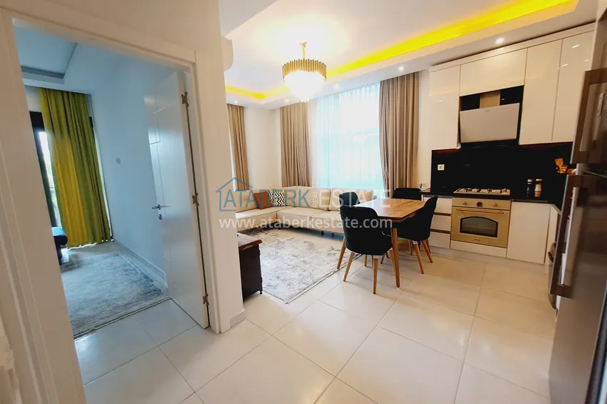 Kupuj  Apartament pod klucz 1+1 z widokiem na ogród w kompleksie hotelowym — Alanya, dzielnica Mahmutlar 4 