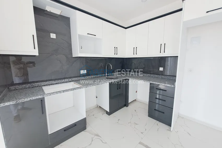 Kupuj  1+1 narożny apartament z pięknym wykończeniem w nowoczesnym kompleksie - dzielnica Avsallar, Alanya 4 