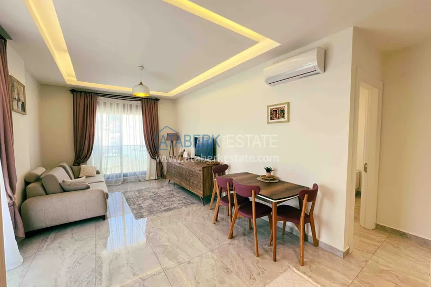 Kupuj  Krótkoterminowy wynajem mieszkania 2+1 w przytulnym kompleksie - centrum Alanyi, obok plaży Kleopatry 6 