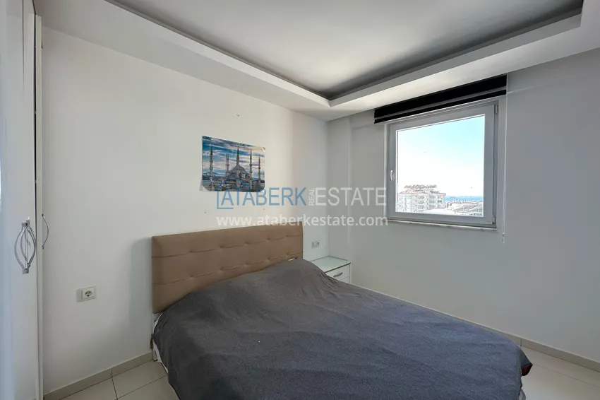 Kupuj Apartament 1+1 z meblami i widokiem na morze w centrum Alanyi - Plaża Kleopatra 7 