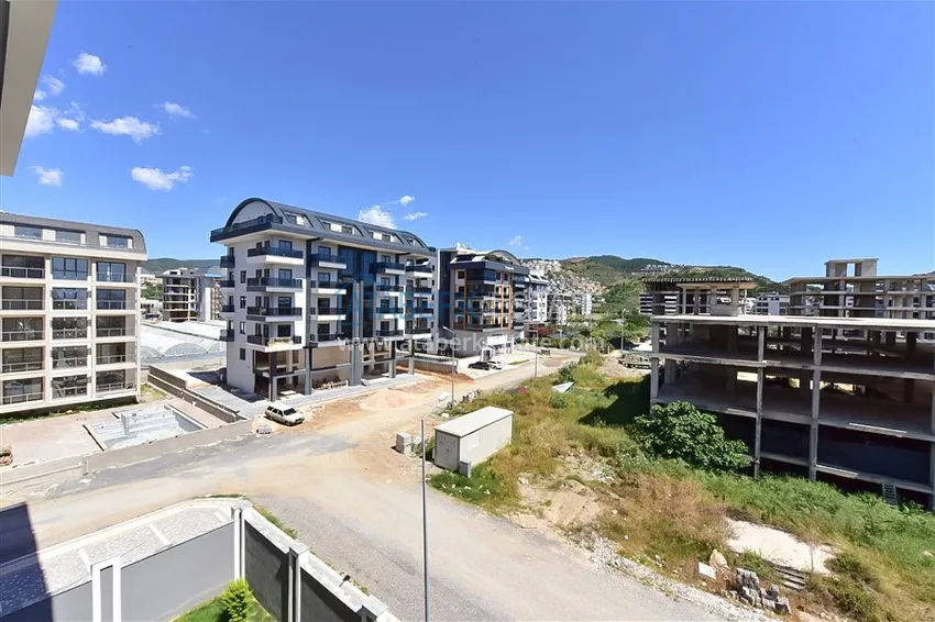 Kupuj  Apartament 1+1 z widokiem na morze w prestiżowym kompleksie — dzielnica Kargicak, 200 metrów od morza  8 