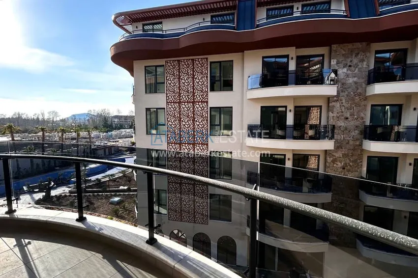 Kupuj  Apartament 1+1 z pięknym wykończeniem w dzielnicy Alanya - Oba  9 