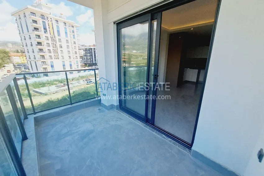 Kupuj  Apartament 1+1 w Alanya, dzielnica Mahmutlar, z pięknym wykończeniem  9 
