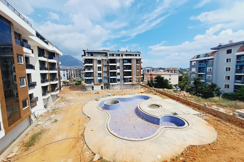 Kupuj  Mieszkanie 1+1 z wykończeniem w nowym kompleksie - Alanya, obszar Oba 9 