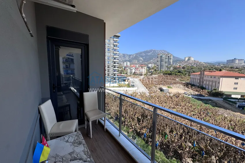 Kupuj  Penthouse 2+1 umeblowany z widokiem na góry w Alanyi, dzielnica Mahmutlar. 12 