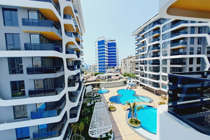 Kupuj  Podstawowa nieruchomość - apartament 2+1 w kompleksie premium, dzielnica Alanya Tosmur 18 