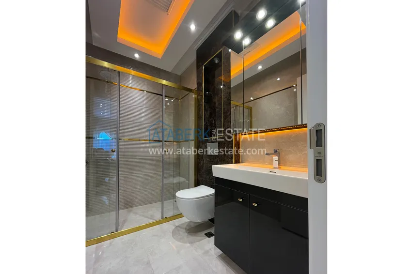 Kupuj  Stylowy apartament 2+1 umeblowany w Mahmutlar - prestiżowym kompleksie z infrastrukturą 18 