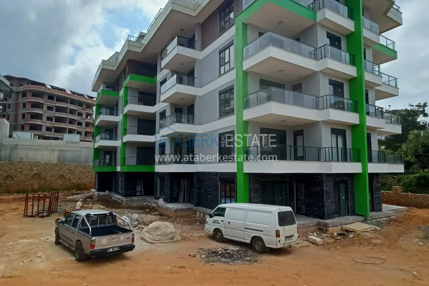 Zdjęcie -  Nowoczesny rodzinny kompleks mieszkalny z luksusową infrastrukturą w budowie — Alanya, Oba 1 