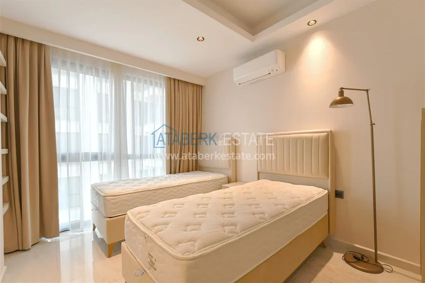 Kupuj  Przestronny apartament pod klucz 2+1 w kompleksie premium na pierwszej linii — Alanya, dzielnica Mahmutlar 11 