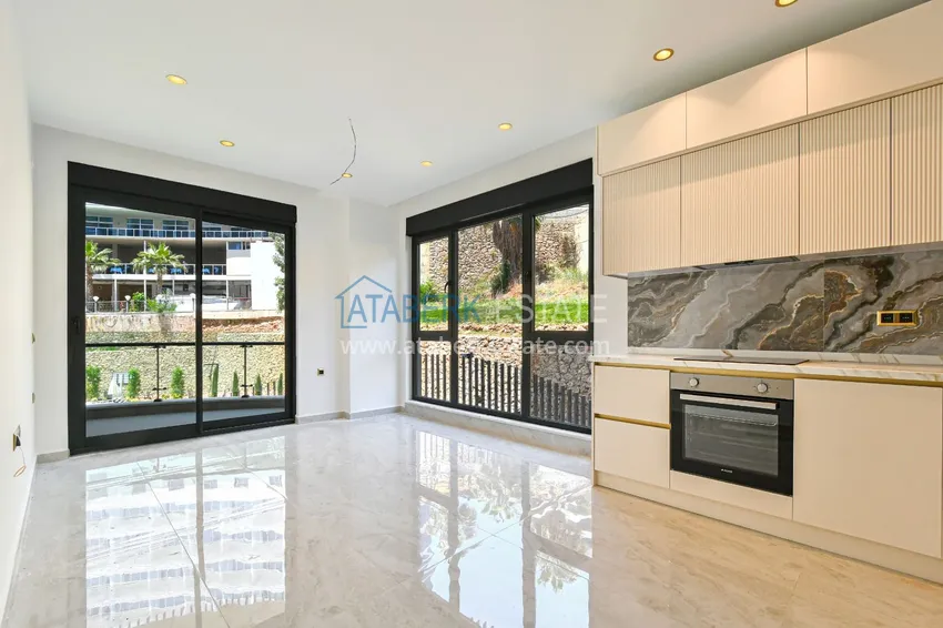 Kupuj  Apartament 1+1 z wysokiej jakości wykończeniami w kompleksie premium — Tosmur, Alanya 2 