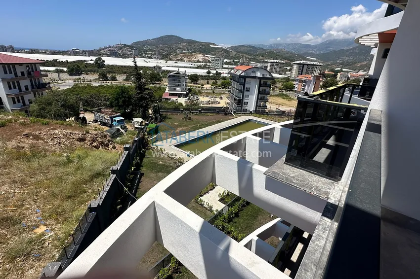 Kupuj  Apartament 1+1 z widokiem na morze w nowym kompleksie - Alanya, dzielnica Demirtash 12 