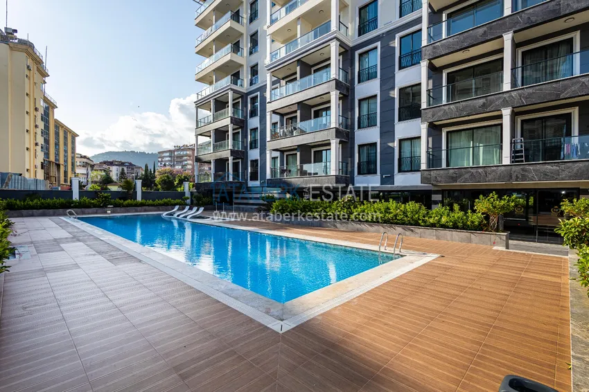 Apartament 1+1 z widokiem na twierdzę Kale — centrum Alanyi, nowy kompleks 8 