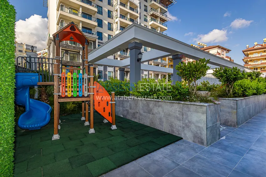 Apartament 1+1 z widokiem na twierdzę Kale — centrum Alanyi, nowy kompleks 9 